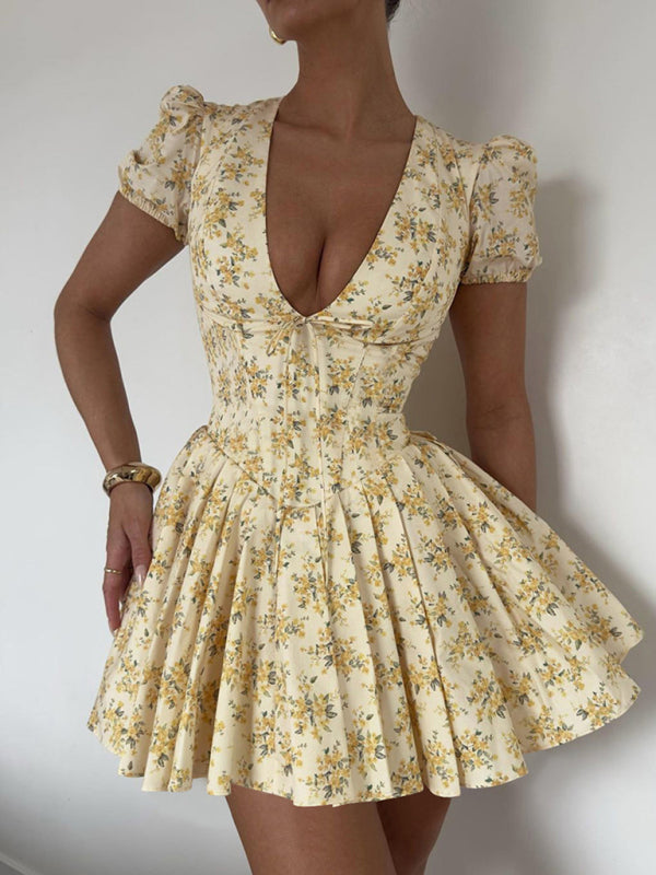 Deep V-Neck Mini Dress with Floral Print and Pleated Skirt